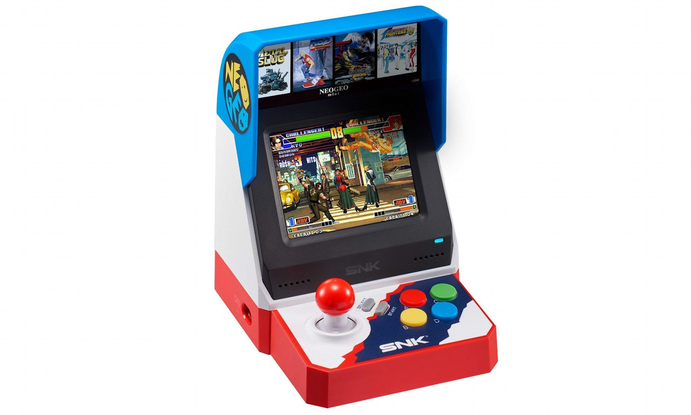 Geo mini. Мини игральный автомат Neo geo Mini. Игровые автоматы 8 бит. Нео с автоматом. SNK Arcade Neo geo games.